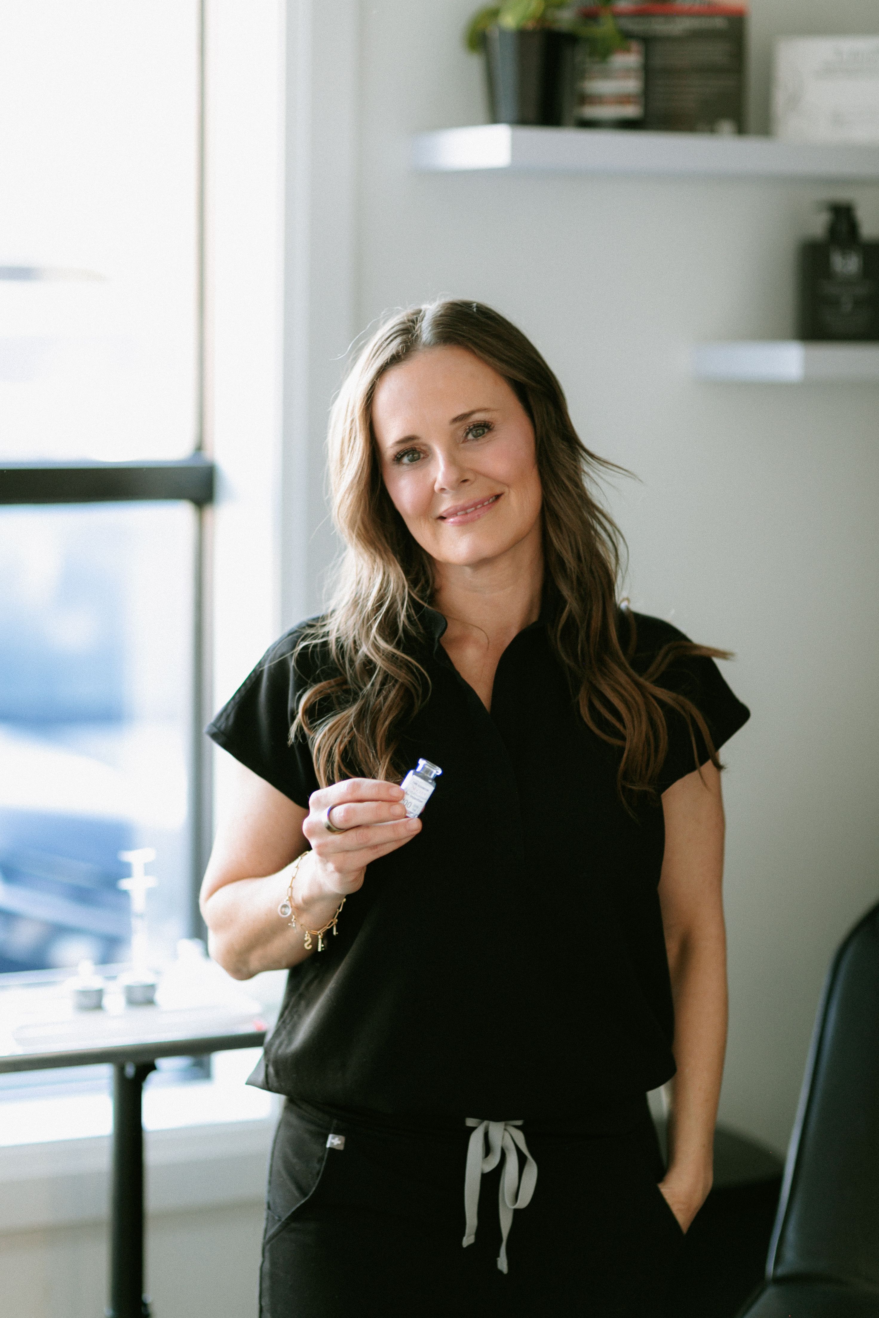 Clinician portrait against dark panel